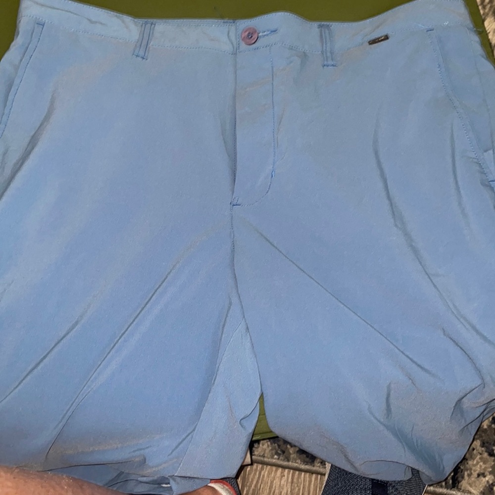 TRAVIS MATHEW SHORTS. Small tear on back right leg